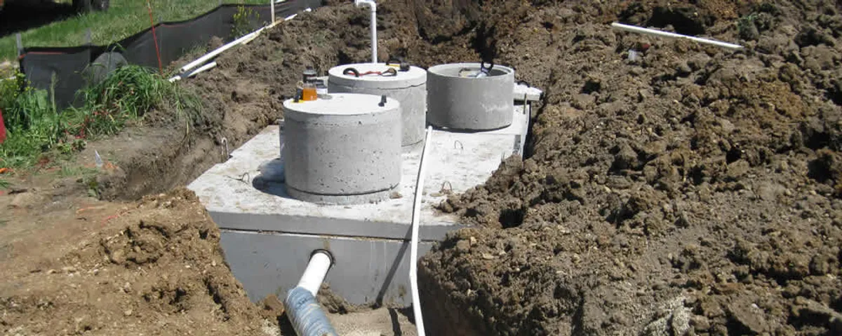 Septic system repair and installation site with tank access ports in Jacksonville, FL
